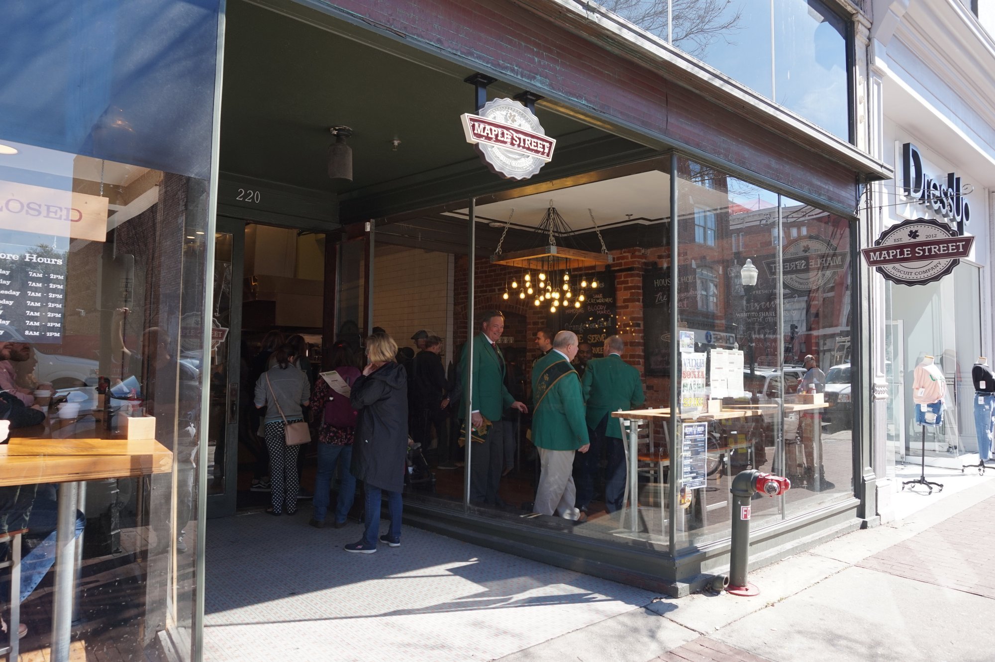 Queue of people outside a Honeycomb bakery.