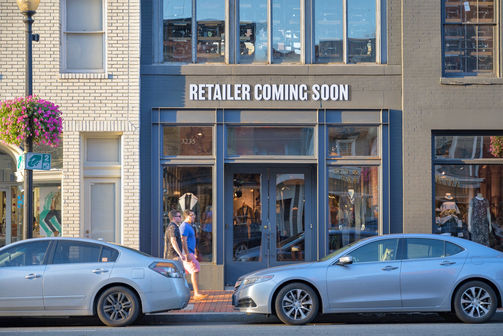 Retailer coming soon sign on storefront