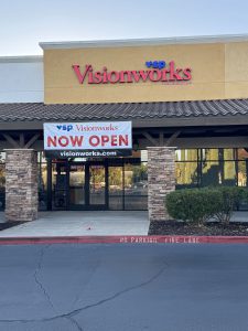 Visionworks storefront sign displaying "Now Open"