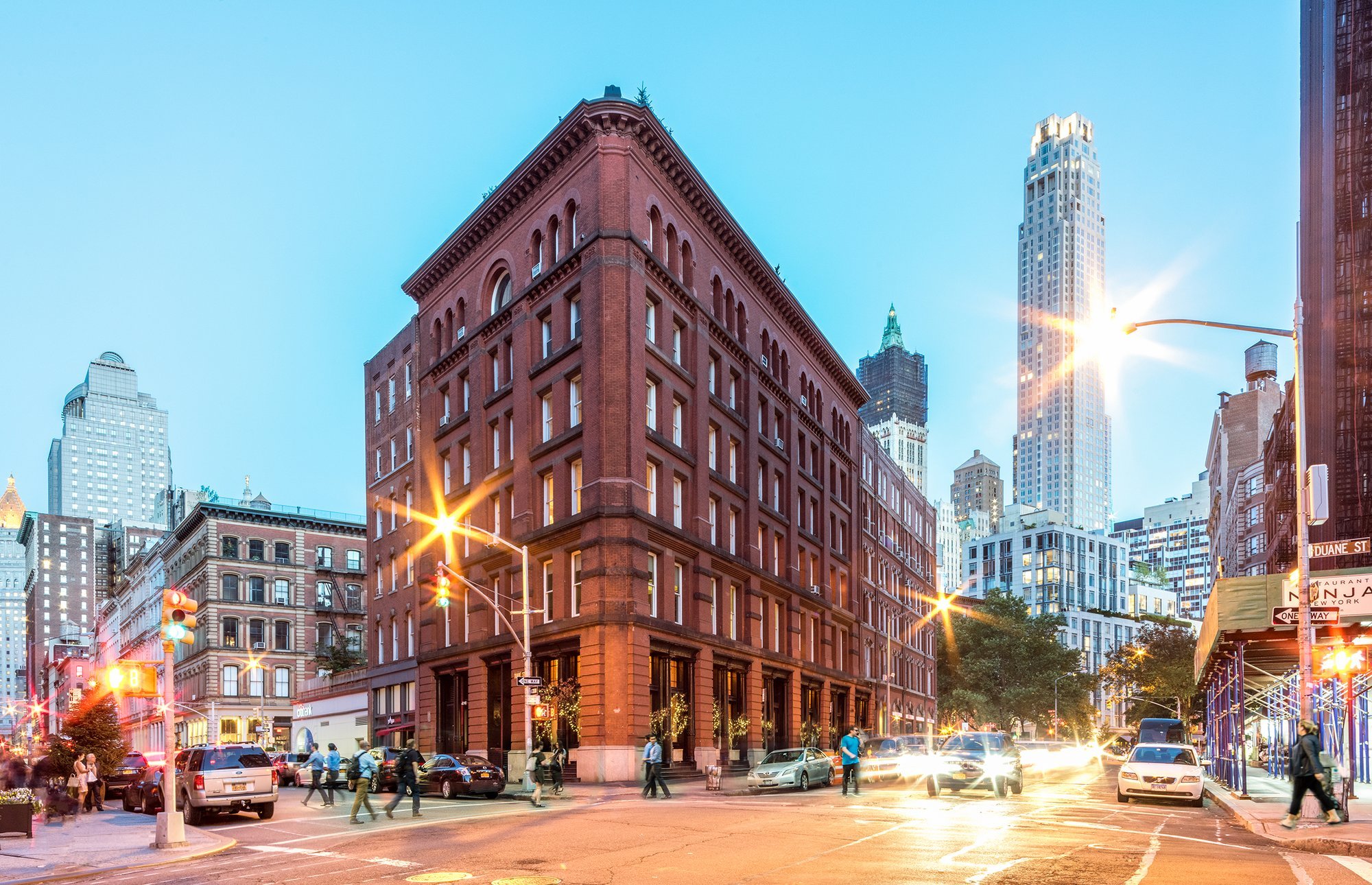 Brick building on city street at dusk