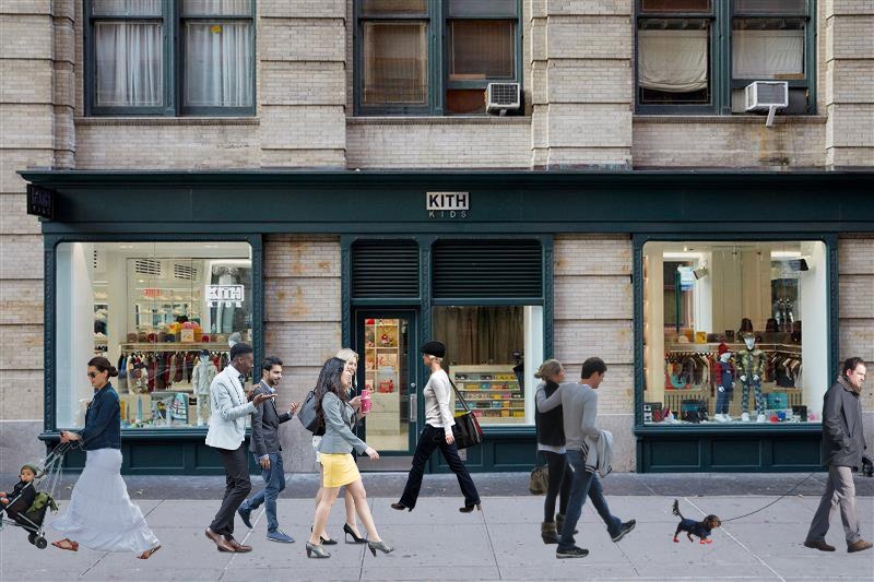 People walking past a city store.