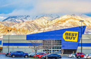 Best Buy store with snow-capped mountains in the background