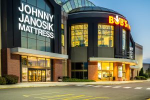 Exterior view of Johnny Manossik Mattress and Bob's Discount Furniture stores.
