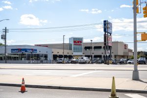 Exterior view of a strip mall with several businesses.
