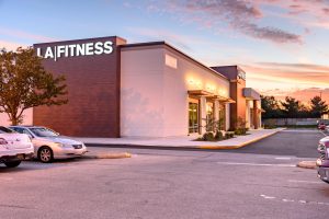 Exterior view of a Fitness center at dusk.