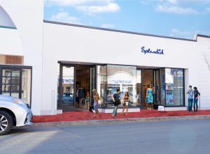 Spell & The Gypsy storefront with customers outside.
