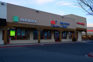 H&R Block and insurance office in a strip mall.