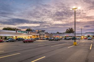 Shopping center at dusk.