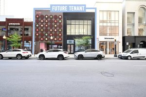 Street view of a commercial building with "Future Tenant" signage.