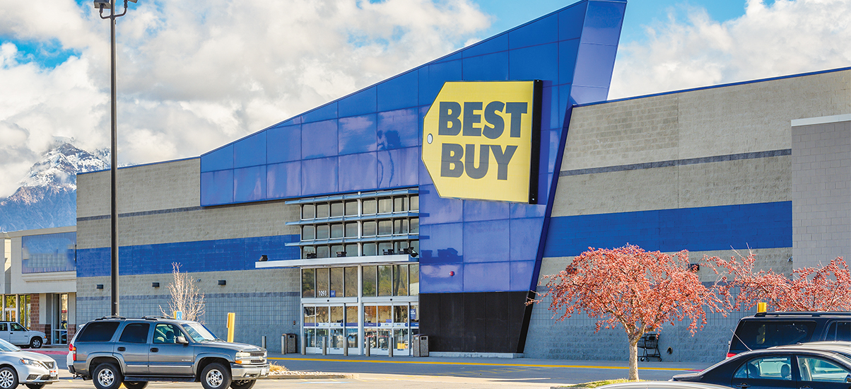 Best Buy store with snow-capped mountains in the background