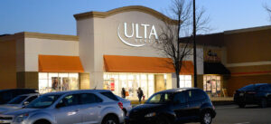 Exterior view of a shopping center on a sunny day.