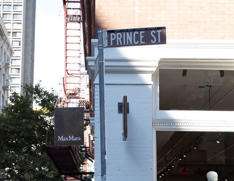 Prince Street sign on a building.