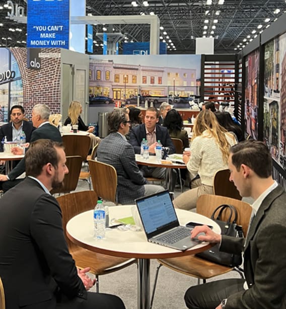 Businesspeople networking at a conference.
