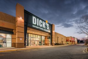 Dick's Sporting Goods store exterior at dusk