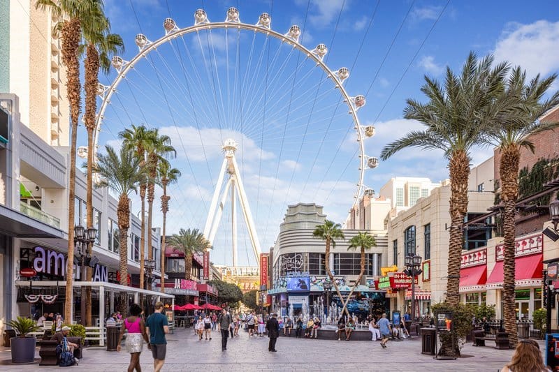 High Roller observation wheel in Las Vegas, with street scene in foreground.